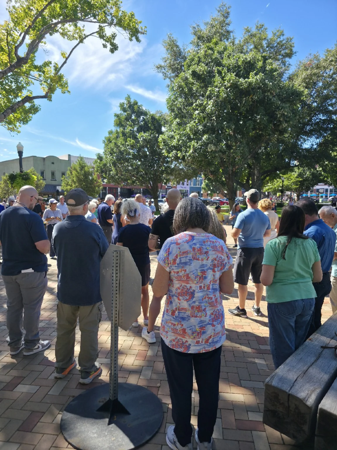 Participants standing together in prayer at the 2026 Bentonville Rosary Rally